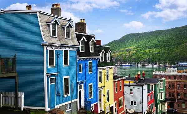 BUS-MARI-VERG Street with colorful houses near ocean in St  John s  Newfoundland  Canada shutterstock 42873700