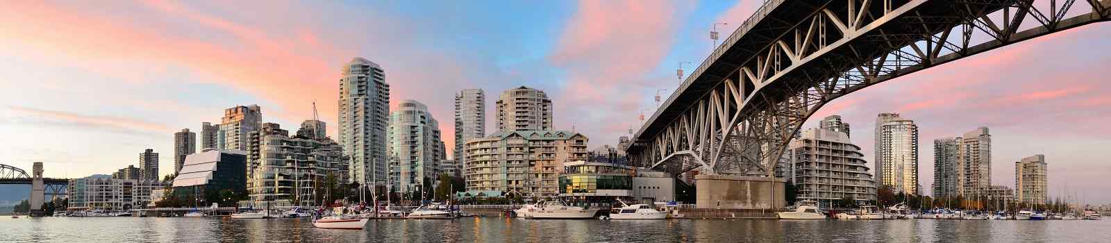 CAD-WEST-WAN Vancouver False Creek panorama at sunset with bridge and boat 438921508