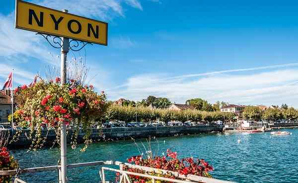 CH-JURA-ROUTE Lakeside sign for Nyon  Lake Geneva in Switzerland 252618232