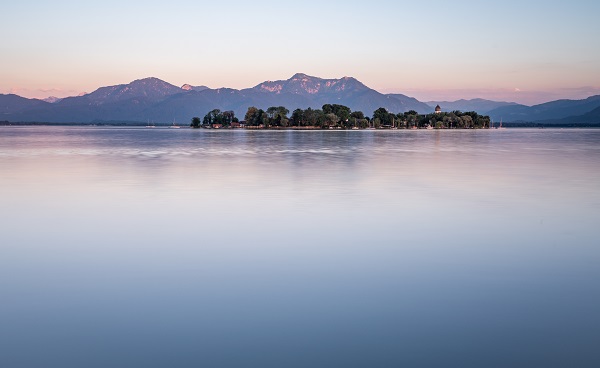 Lake Chiemsee and Fraueninsel at sunset in Bavaria  Germany 1133887439