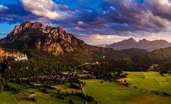 Panorama from the air sunset Forggensee and Schwangau  Germany  Bavaria 706056838