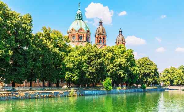 Scenic summer view of Isar river embankment architecture in the Old Town of Munich shutterstock 617797685