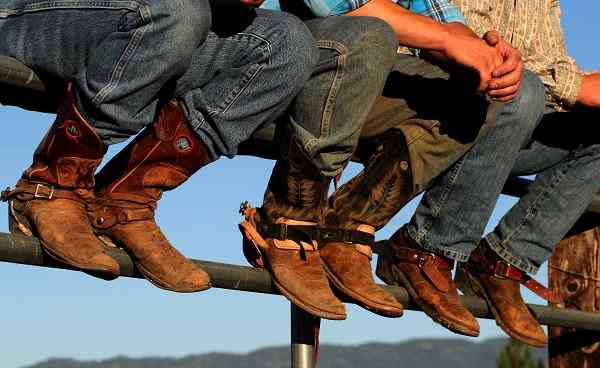 Well worn boots adorn the wranglers at rodeo in small county fair, Idaho_15983935.jpg